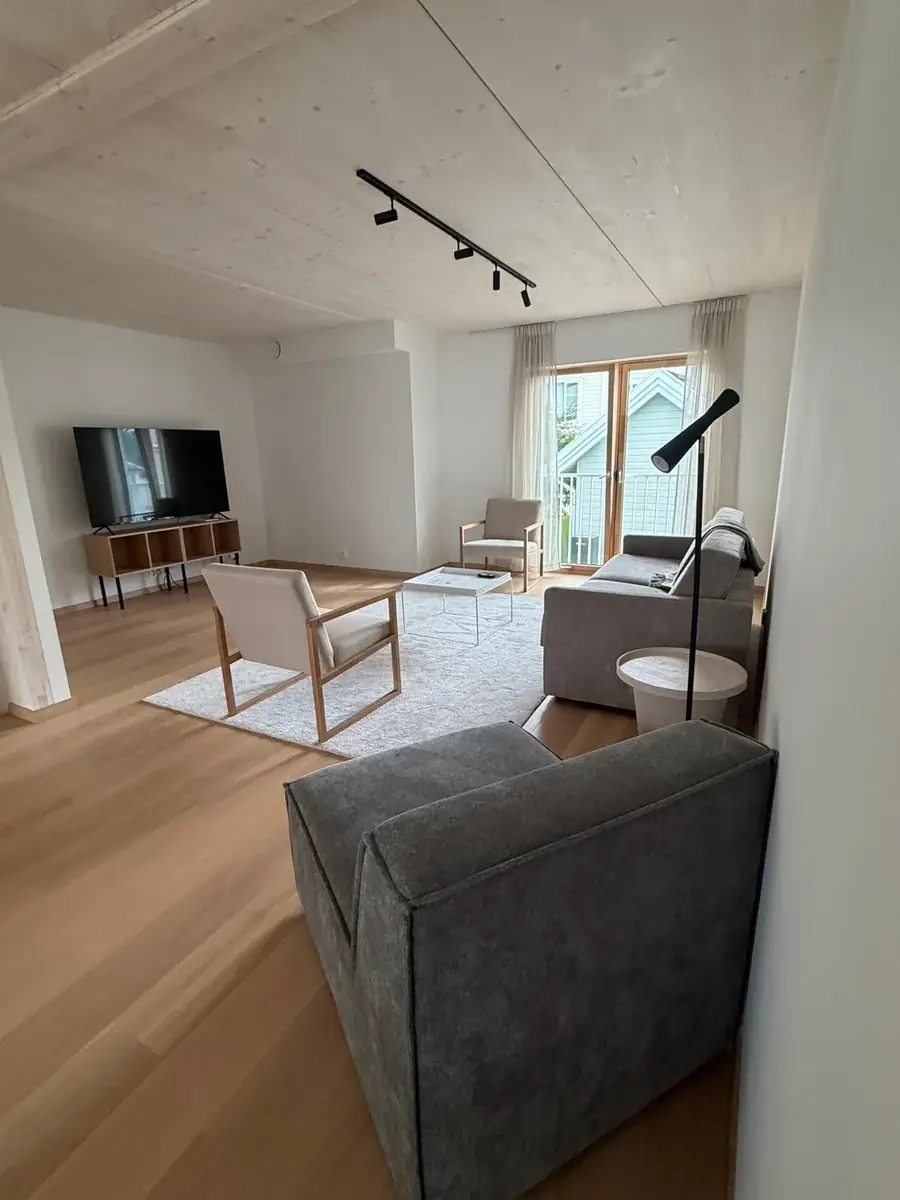 Wohnzimmer mit Balkon